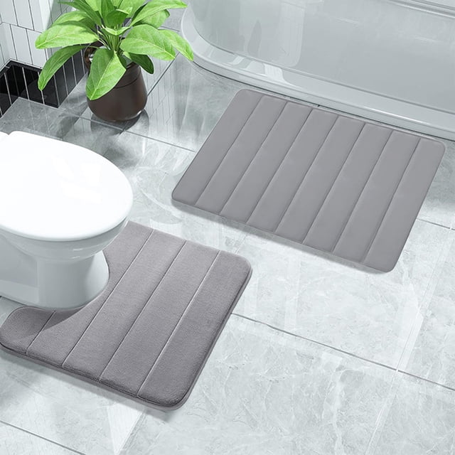 Sokhug Rugs Clearance Bathroom Rugs Sets 2 Foam Bath Mat for Toilet in grey, featuring a soft and absorbent memory foam design with coral velvet surface. Includes two mats: one rectangular and one contoured for toilet placement. Non-slip rubber backing ensures stability on bathroom floors. Quick-dry and stain-resistant, machine washable for easy care.