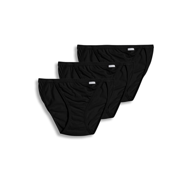 Jockey Culotte String pour Femmes Elance - Lot de 3 Comprenant Trois Culottes String Noires Style Bikini. Fabriquée en Coton Peigné 100 % Filé à l'Anneau pour une Sensation Douce et Respirante. Conçue à Taille Basse, Couvrance Totale et Ceinture et Ouvertures de Jambe Recouvertes de Tissu pour un Confort Accru. Convient au Port Quotidien et Lavable à la machine.
