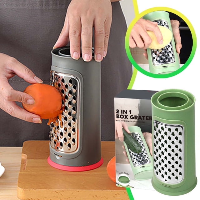 Urbanstrive Stainless Steel Kitchen Handheld Grater for Cheese and Vegetables with Secure Container and Ergonomic Handle. The grater features a cylindrical design with stainless steel grating panels and a built-in transparent container for catching shredded food. A person is shown grating a carrot on the grater, demonstrating its functionality. The ergonomic handle and stable base ensure safe and comfortable use. Compact and space-saving, ideal for grating cheese, potatoes, carrots, and other firm vegetables.