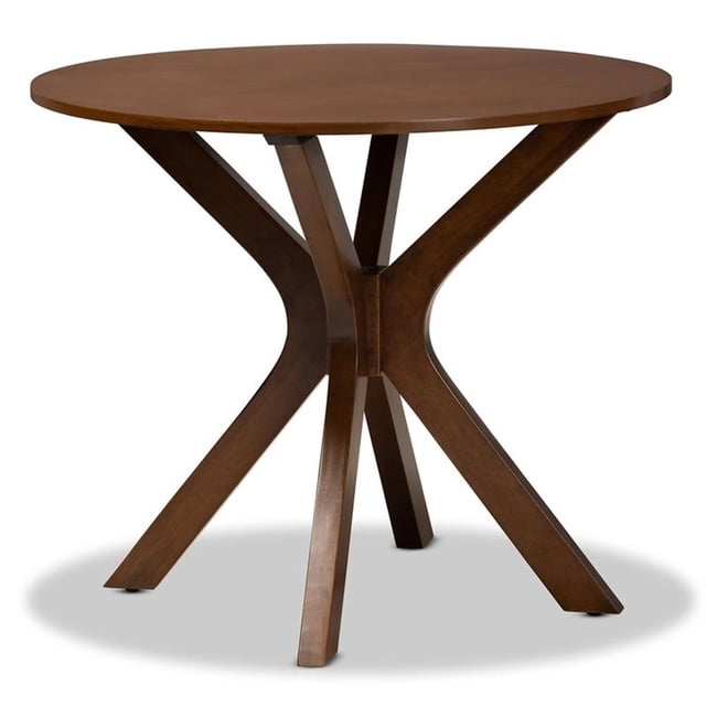 Bowery Hill Mahogany Walnut Brown Finished 35-Inch-Wide Round Wood Dining Table featuring a round tabletop with a walnut brown finish and splayed legs forming a sculptural base. Made from rubberwood and MDF wood, this table seats up to four and measures 29.9 inches high by 35.4 inches wide. Ideal for casual or formal dining, it requires assembly and is crafted in Malaysia.