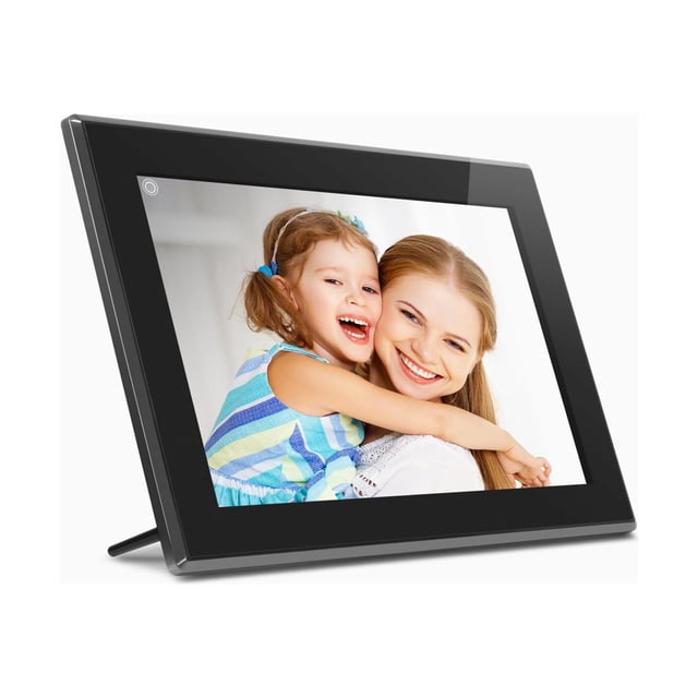 Aluratek 15” WiFi Digital Photo Frame with touchscreen IPS LCD display showing a photo of a child in a blue and green striped dress hugging an adult, displayed in a black frame with stand, angled on a white background.