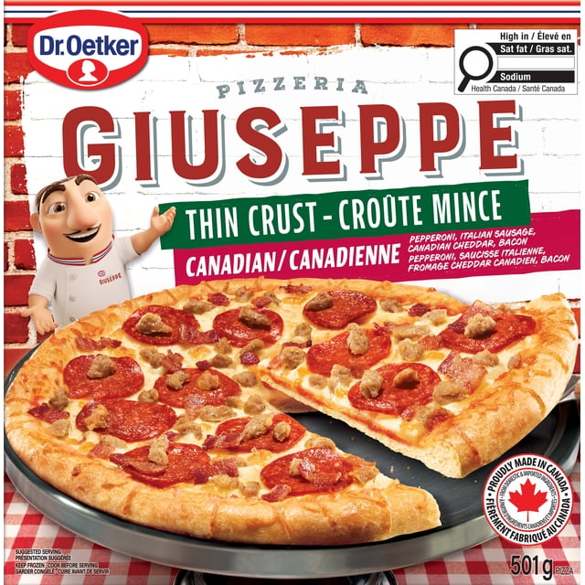 Dr. Oetker Giuseppe Pizzeria Thin Crust Canadian Pizza on a round metal tray, topped with pepperoni, Italian sausage, Canadian cheddar, bacon, and melted mozzarella cheese on a golden thin crust, with packaging showing Canadian-made label and nutrition information.