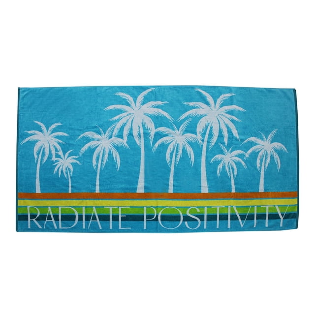 Hometrends Yarn Dyed Jacquard Beach Towel in blue with white palm tree silhouettes and multicolored horizontal stripes in orange, yellow, green, and dark blue, featuring the phrase 'RADIATE POSITIVITY' along the bottom edge, measuring 38 by 72 inches, made of 100% cotton with soft velour and terry sides for absorbency, suitable for beach use or wrapping up on cooler days.