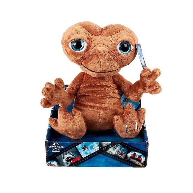 E.T. Jouet en Peluche Personnage, un Toutou Doux et Câlin de 25 cm Mettant en Vedette l'Emblématique Extraterrestre du Film Steven Spielberg des Années 1980. la Peluche a Brodé « E.T. » sur Son Pied et un Détail de Doigt Pointu, Idéal pour les Collectionneurs et les fans, Présenté dans une Boîte Thématique avec des Photos de Film Universelles.