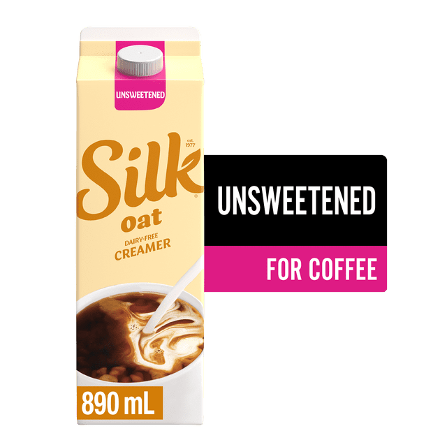 Silk Oat Coffee Creamer Unsweetened dairy-free vegan plant-based non-dairy creamer in an 890 ml beige carton with pink cap, showing coffee with creamer swirling inside, often used to add creamy texture to coffee and other beverages.