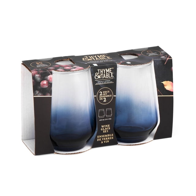 Thyme & Table Stemless Wine Glasses, 2-Piece Set with two 400ml glasses featuring a blue gradient from base to rim, packaged in a black box with grape and leaf designs, ideal for wine serving and home barware.