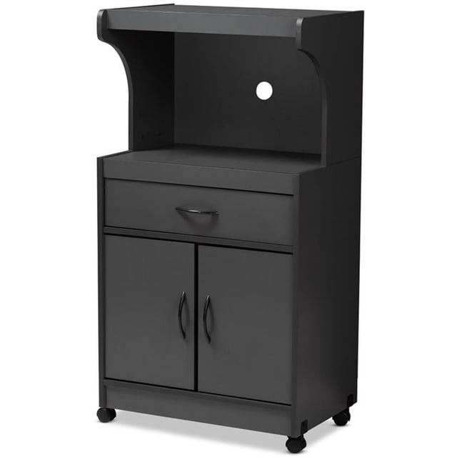 Baxton Studio Tannis Support de Micro-Ondes en Gris Foncé Présentant une silhouette Rectangulaire Moderne avec un Cadre en Bois d'Ingénierie Gris Foncé. Comprend un Compartiment pour Micro-Ondes avec une Découpe au Panneau Arrière pour la Gestion des Fils, un Tiroir avec Poignée Noire et Deux Tablettes derrière des Portes Discrètes pour le Rangement. Équipé de Roulettes pour la Mobilité. Dimensions : 45,2 Pouces de Hauteur, 24,02 Pouces de Largeur et 15,75 Pouces de Profondeur. Assemblage Requis.
