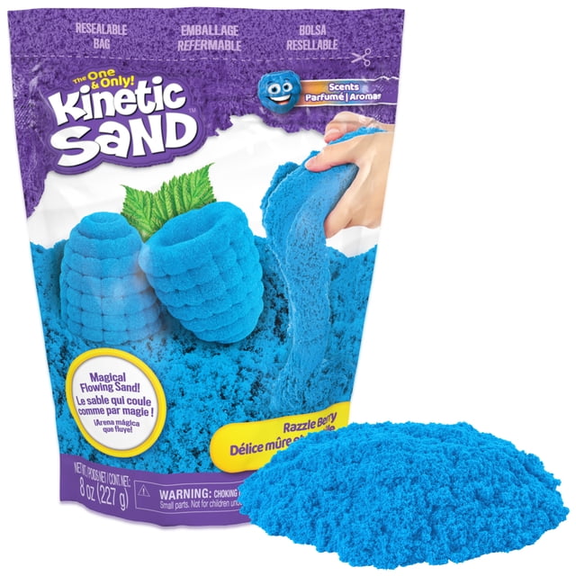 Kinetic Sand Scents 8oz Blue Razzle Berry scented kinetic sand in a resealable purple bag with molded sand shapes and a hand stretching the blue sand, ideal for imaginative arts and crafts play for kids aged 3 and up.