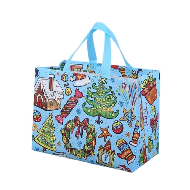 QIPOPIQ Tote Bags With Handles, reusable grocery bags made of non-woven fabric, featuring a festive Christmas-themed design with colorful illustrations of trees, wreaths, and gifts on a light blue background. The bag measures 12.8 x 9.8 x 6.7 inches (32 x 25 x 17 cm) and includes sturdy handles for easy carrying. Ideal for holiday parties, gift wrapping, grocery shopping, or storage.
