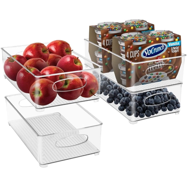 Sorbus Plastic Storage Bins Stackable Clear Pantry Organizer Box Bin Containers (4-pack) holding apples, blueberries, and yogurt cups. Made of strong clear plastic with built-in side handles for easy transport and stackable design to maximize space. Perfect for food storage, fridge organizers, or bathroom supplies.