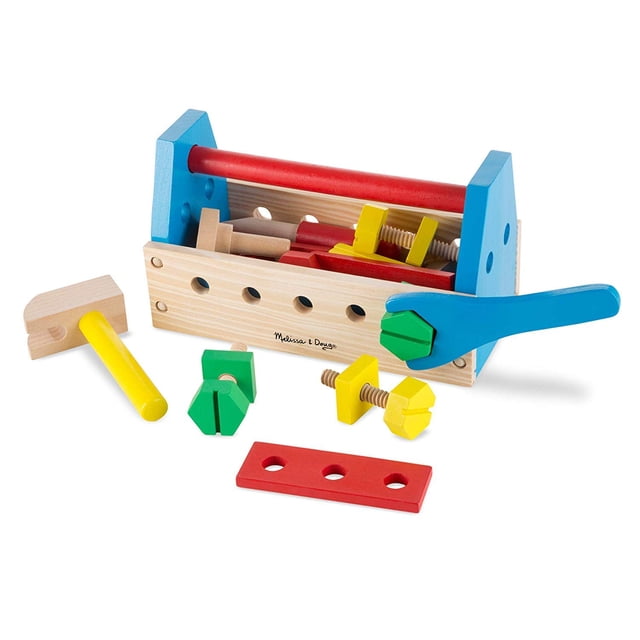 Melissa & Doug Take-Along Tool Kit Wooden Construction Toy (24 pcs) centered front-facing view of an open wooden carry case displaying 24 painted wooden pieces — hammer, wrench, screwdriver, nuts, bolts, hinges and planks with visible wood grain and carry handle; plain light background, often used as a compact storage set for pretend-tool play.