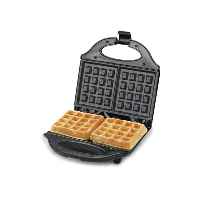 COMMERCIAL CHEF waffle maker with nonstick removable plates open showing two golden belgian waffles, black cool touch housing with handle and power on light, skid-resistant feet for stable countertop use, compact electric waffle iron for breakfast
