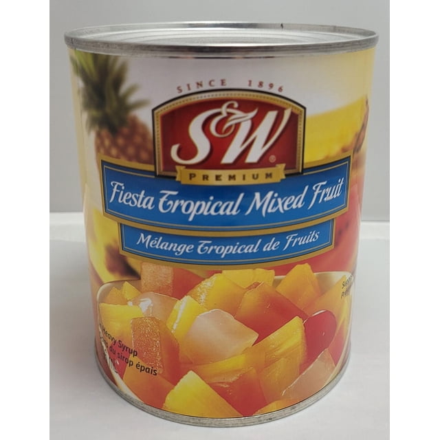 S&W Fiesta Tropical Mixed Fruit canned food showing diced tropical fruits in heavy syrup with a yellow and red label featuring the S&W logo and bilingual English and French text, ideal for snacks, desserts, or adding to international recipes.