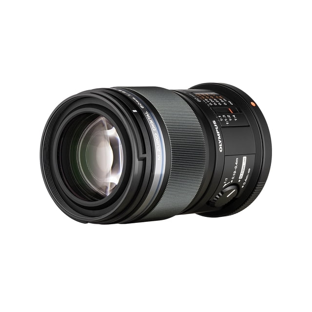 Olympus MZ 60mm Macro Lens, also known as the M. Zuiko Digital ED 60mm f2.8 Macro, featuring a 60mm focal length and 1x magnification. Designed for macro photography, it offers a 7.4-inch minimum focusing distance and weatherproof construction. The lens includes 13 elements in 10 groups with ED, HR, and E-HR glass to reduce chromatic aberrations. It incorporates a focus limit switch, a distance/magnification indicator, and Olympus's MSC mechanism for smooth autofocusing.