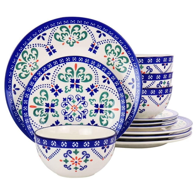 Laurie Gates Tierra Star 12 Piece Hand Painted Stoneware Dinnerware Set includes 11-inch dinner plates, 8-inch dessert plates, and 6-inch bowls with hand painted blue, green, and red floral designs on white stoneware. Durable, microwave and dishwasher safe, suitable for everyday dining and casual entertaining.