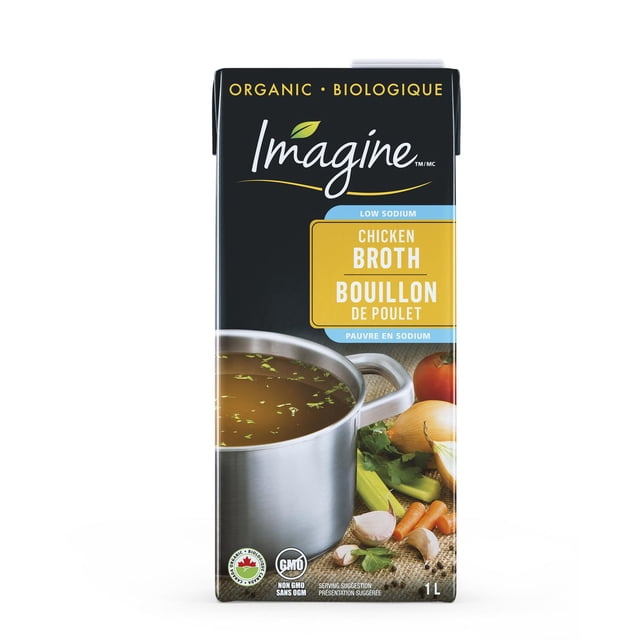 Imagine Low Sodium Organic Chicken Broth 1L carton with a black and yellow label, featuring a stainless steel pot of herb-garnished broth surrounded by fresh vegetables including garlic, carrots, celery, onion, and tomato on a burlap surface, highlighting its organic, non-GMO, and low sodium qualities, ideal for soups, stews, and slow cooker recipes.