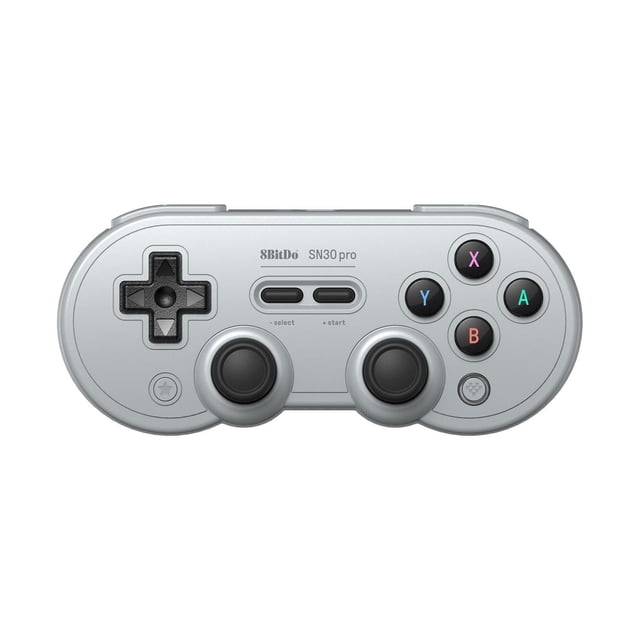 8BitDo SN30 Pro Bluetooth Gamepad - Hall Edition - Grey shown front-facing with a retro oval shape and grey matte finish, featuring a classic black cross d-pad on the left, two clickable black Hall Effect joysticks below select and start buttons, and four colored action buttons labeled X, Y, B, and A on the right, compatible with Nintendo Switch, Windows, Apple, Android, and Steam Deck, also suitable for wireless Bluetooth gaming and motion controls.