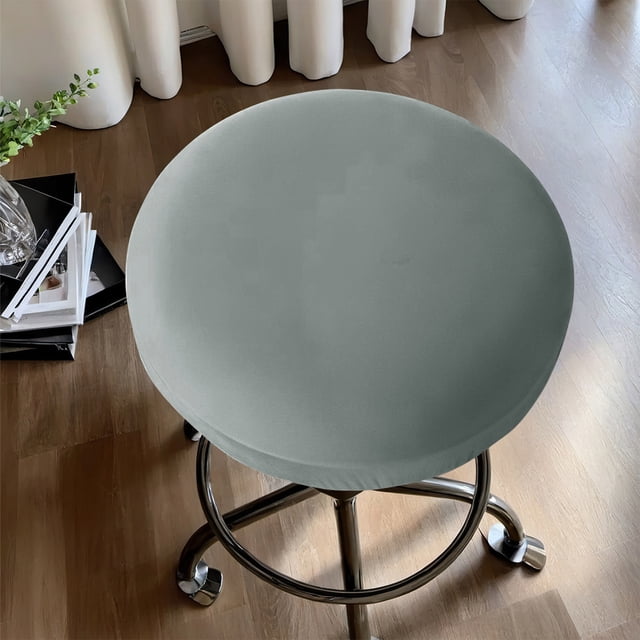 Czzoypi Round Bar Stool Seat CoversStretch Round Bar Stool Covers Washable Bar Stool Seat Covers in gray, designed for round bar stools with a chrome base. Made of elastic milk silk polyester, this stretchable seat cover offers a snug fit, protects against spills and stains, and is easy to clean. Suitable for kitchen and dining seating, it can also be used to protect stools in outdoor settings.