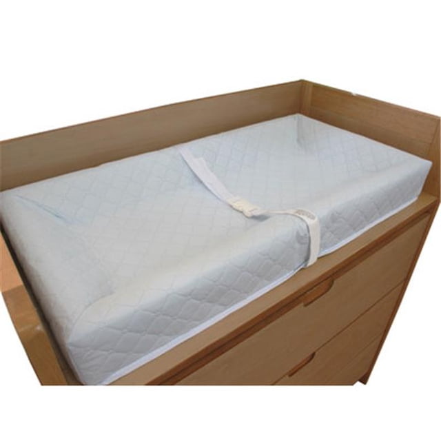 L A Baby 30 in. 4 Sided Changing Pad in white with quilted vinyl cover. The pad features four 4-inch-high sides for added safety, a non-skid bottom to prevent sliding, and a safety harness with a quick-release buckle. Includes a security strap for securing the pad to a changing table. The waterproof, non-toxic, and stain-resistant cover is easy to clean with mild soap and water. Shown placed on a wooden changing table.