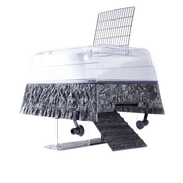Penn-Plax Turtle Topper Basking Platform for 55-gallon tanks, with a black textured plastic base, clear top with hinged access grill, docking ramp for easy climbing, and two adjustable suction cups for mounting on tanks up to 13 inches wide.