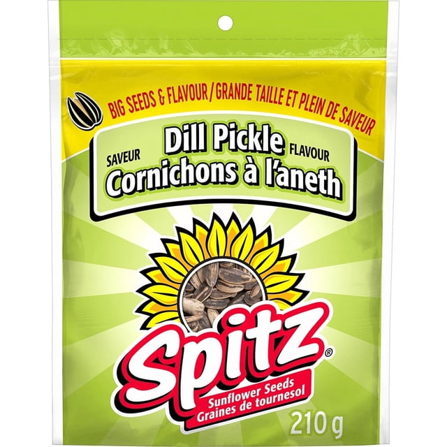 Spitz Dill Pickle Sunflower Seeds 210 g resealable bag with green and yellow packaging, featuring a sunflower graphic and bold red Spitz logo, highlighting big seeds and tangy dill pickle flavour in English and French, suitable for a crunchy, fibre-rich snack.