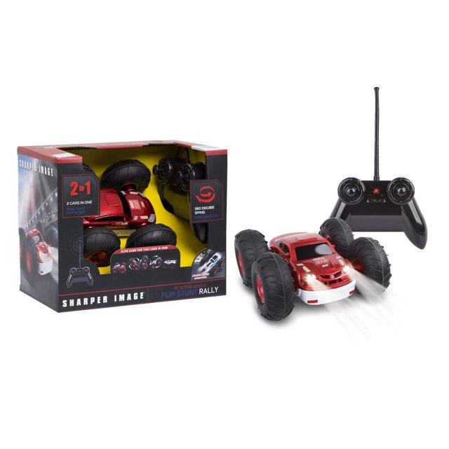 Sharper Image Toy Vehicle Flip Stunt Rally remote control stunt car with dual-sided red and white body and large black tires, shown with black controller and packaging highlighting 2-in-1 flip design and 360-degree spins, ideal for stunt racing play.