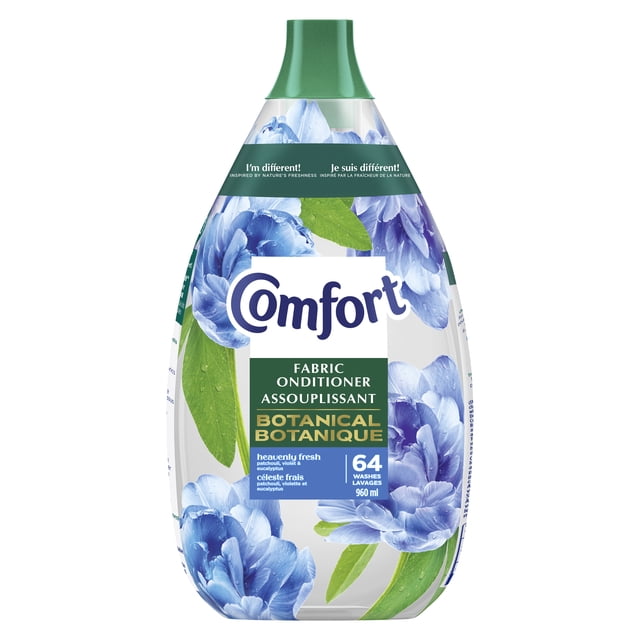 Comfort Fabric Conditioner Heavenly Fresh 64W 960ml bottle with transparent CrystalFresh formula, blue floral and green leaf botanical design, green cap, enriched with essential oils of patchouli, violet, and eucalyptus, suitable for all fabric types.