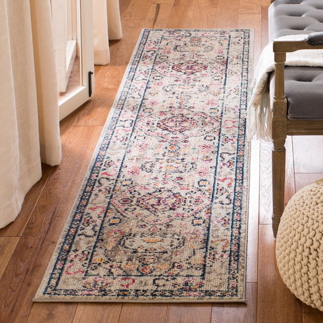 Safavieh Madison Trenton Vintage Traditional Area Rug runner with a vintage floral and geometric pattern in beige, navy, pink, and orange tones, power loomed for durability, placed on hardwood floor beside a gray upholstered bench and cream curtains, ideal for adding transitional style to hallways or entryways.