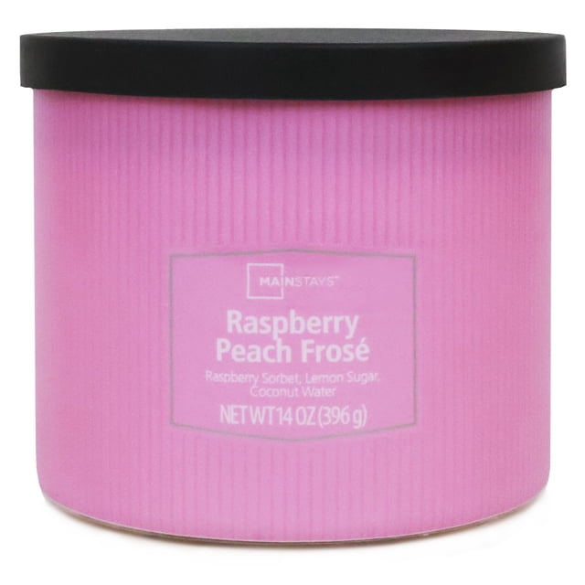 Mainstays 3-Wick Textured Wrapped Raspberry Peach Frose Scented Candle, 14 oz, front view of a pink textured jar candle with a black lid and label listing raspberry sorbet, lemon sugar, and coconut water fragrance notes, suitable for home décor and relaxation.