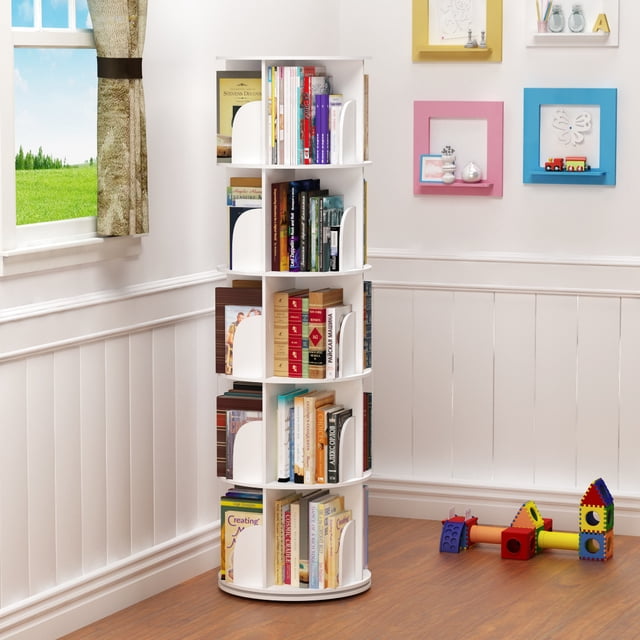 TOYTEXX 5-Tier 360° Rotating Stackable Bookshelf Organizer shown in a well-lit, child-friendly room. The white bookshelf, made from eco-friendly wood-plastic material, features five tiers for organizing books, toys, and decor. Its 360° rotating base allows easy access, and built-in baffles keep items secure. The modern, stackable design is ideal for home or office use, with the unit fully assembled and stocked with books and decorative items.