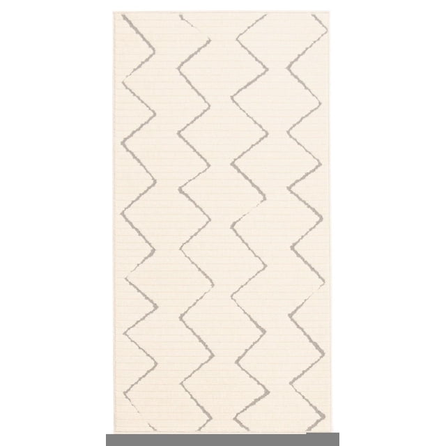 ECARPET Indoor/Outdoor for Balcony, Patio and Garden Raya Ivory Rug with a rectangular shape, ivory base, and light gray zigzag pattern. This flat weave rug suits indoor and outdoor use, complementing mid-century modern and urban interiors, and is ideal for busy living spaces or patios.