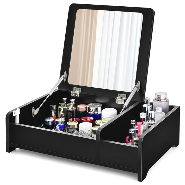 Gymax 2-in-1 Vanity Dresser in black with a flip-top mirror and tabletop storage box. The dresser features a large hidden compartment beneath the top for dust-free storage of cosmetics, jewelry, and skincare products. The side open shelf provides easy access to frequently used items like lipsticks and perfumes. Made of engineered wood and glass, the vanity includes a high-quality mirror and pneumatic rods for smooth operation. Compact and versatile, it can also be used as a laptop desk.