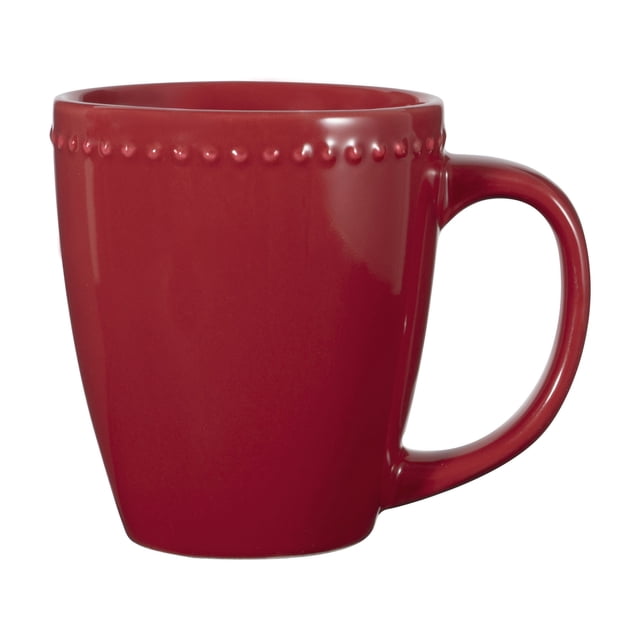 Mainstays Brynn Red 16oz Mug in side profile, crafted from red stoneware with a row of raised dots near the rim and a large handle, microwave and dishwasher safe, suitable for daily coffee or tea in home dining and entertaining.