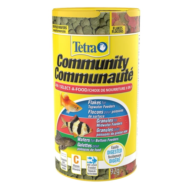 Tetra Community 3-in-1 Select-A-Food fish food canister with yellow lid, containing flakes for topwater feeders, granules for midwater feeders, and mini wafers for bottom feeders, enriched with vitamin C and suitable for all feeder levels, weighing 92 grams.