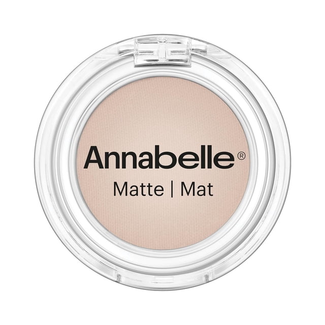 Annabelle Matte Single Eyeshadow in Ivory in a clear round compact with transparent lid, featuring a finely milled, velvety matte powder ideal for smooth, long-lasting, crease-free eye makeup application and blending.