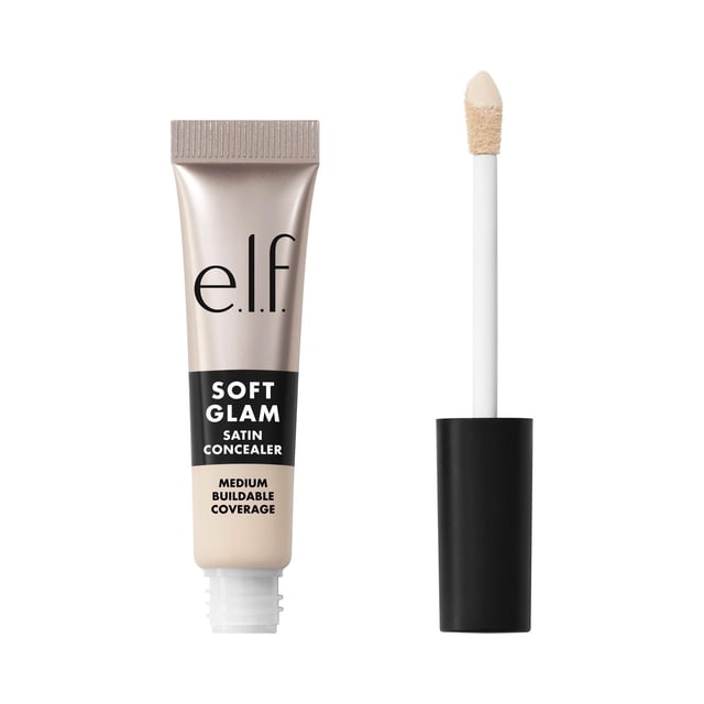 e.l.f. Cosmetics Soft Glam Satin Concealer, 10 Fair Cool, 6.3 mL, featuring a beige and taupe squeezable tube with black and white text, alongside a black-capped doe-foot applicator wand coated in light beige concealer, providing medium buildable coverage and a satin finish ideal for face makeup and concealing imperfections.
