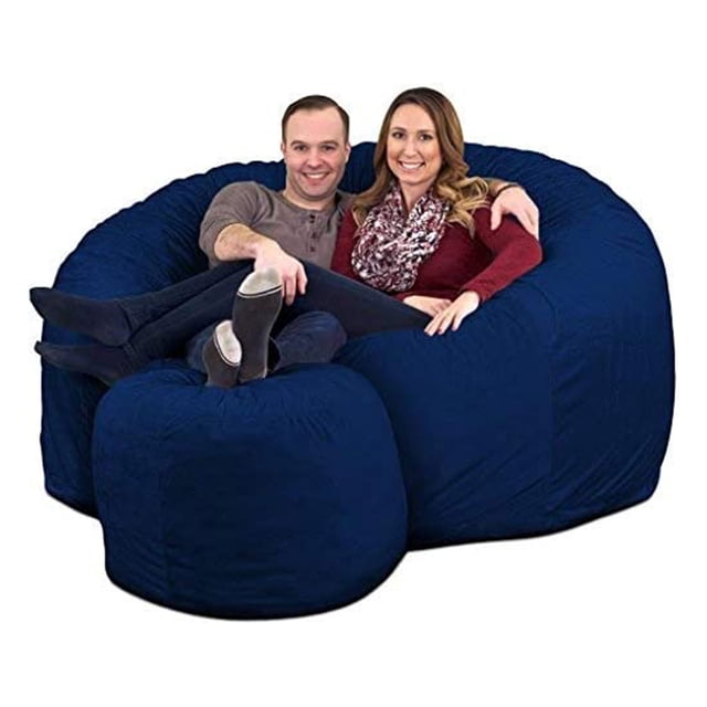 Ultimate Sack 6000 6-Foot Bean Bag Chair with Footstool Set in electric blue suede cover. This oversized bean bag chair and matching footstool provide a comfortable seating option for kids' rooms, playrooms, or dorms. Filled with shredded foam for balanced support, the chair features a removable, machine-washable suede cover with durable double stitching. Ideal for lounging, gaming, or relaxing.