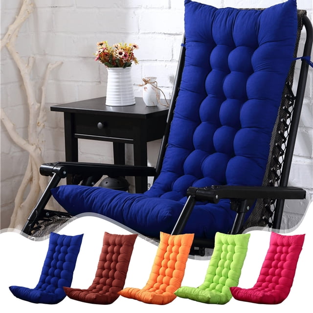 Wzzjkit Rocking Chair Cushion, a high-back patio chair cushion shown in a vibrant blue color, designed for indoor and outdoor use. The cushion features thickened padding, tufted detailing, and ties for secure attachment. Displayed on a black metal rocking chair in a cozy indoor setting with a white brick wall and a side table holding a vase of flowers. Additional color options, including red, orange, green, and pink, are shown below.