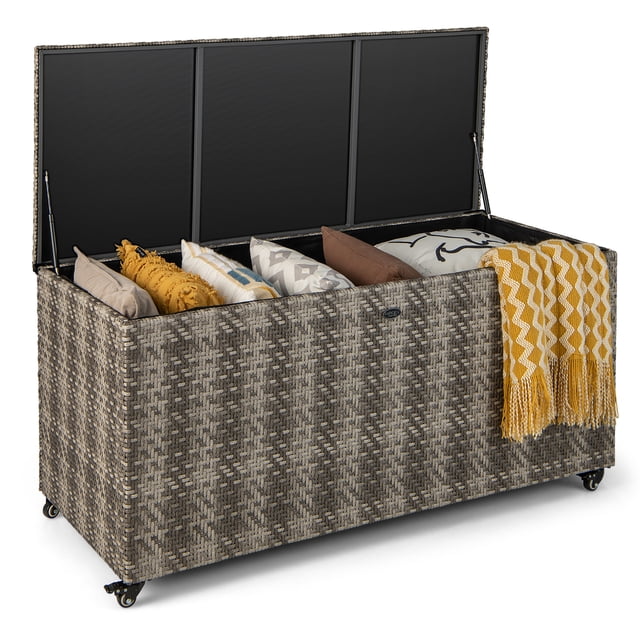 Costway 96 Gallon Patio Rattan Storage Deck Box Container in mix grey with hand-woven PE wicker and rustproof metal frame. The box features an open lid supported by gas struts, revealing a 96-gallon interior with cushions and a waterproof liner. Equipped with 4 wheels, including 2 lockable ones, for easy mobility. Ideal for deck storage in gardens, poolside, or backyards.