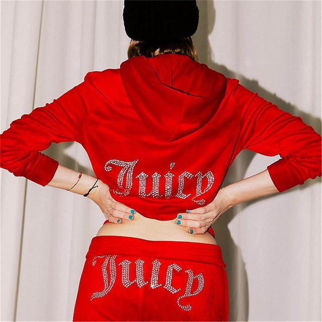 Women Velvet Juicy Tracksuit Couture Tracksuit Two Piece Set Couture Sweatsuits in a vibrant red color. The set includes a hooded sweatshirt and matching pants, both featuring the word 'Juicy' embellished with rhinestones on the back and lower waist. Made from a cotton and polyester blend, this casual outfit is designed for comfort and style.