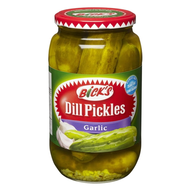 Bick’s Garlic Whole Dill Pickles in a 1L clear glass jar with a red safety lid, containing whole pickles in brine with garlic and spices visible at the bottom, labelled with green and red branding highlighting zero fat and low calorie, ideal as a crunchy, tangy condiment or low-calorie snack.