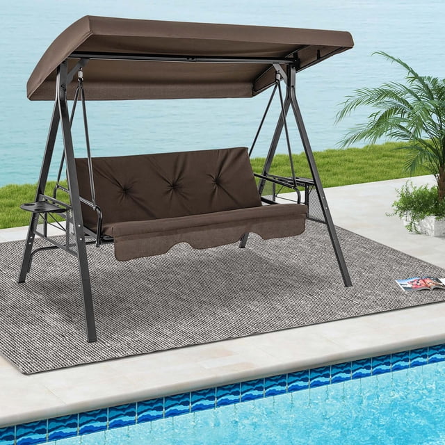 Costway Balançoire de Patio 3 Places Porch Swing avec Auvent Ajustable Brun, Dotée d'Un Cadre Métallique Robuste Pouvant Supporter jusqu'à 1000 Lb. la Balançoire Comprend des Coussins d'Assise et de Dossier Doux, des tables d'Appoint Pliantes et un design convertible Qui Lui Permet de Se Transformer en Lit Plat. l'Auvent Ajustable Offre une protection Solaire, et la Balançoire Est Idéale pour les Espaces Extérieurs comme les Cours Arrière, le Bord de la Piscine Ou les Balcons.
