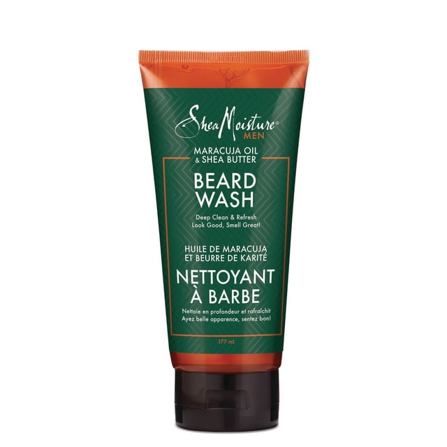 SheaMoisture Maracuja Oil and Shea Butter Beard Wash in a 177 mL green and orange squeeze tube with black flip cap, formulated for men's beard care to deeply clean and refresh facial hair and skin without drying, featuring bilingual English and French text.