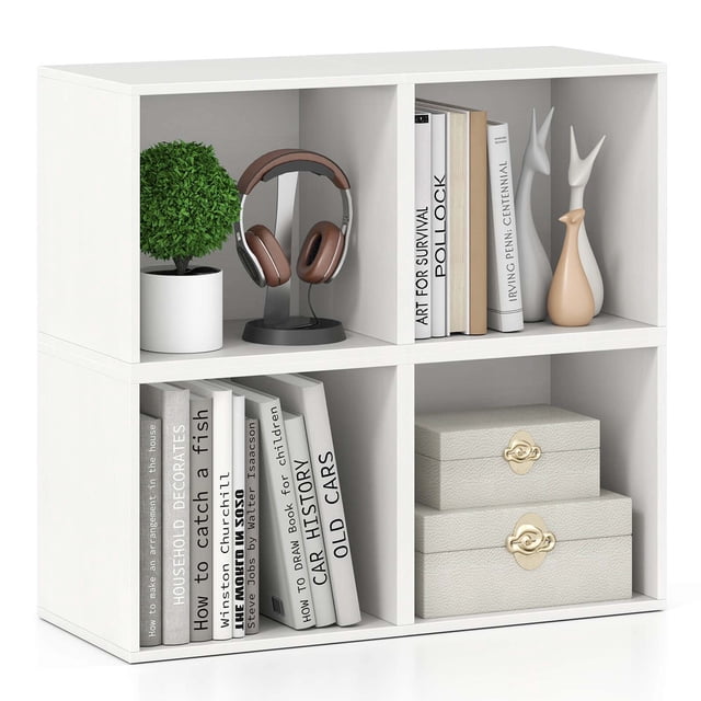 Costway 4 PCS Wooden Cube Storage Organizer Stackable Open Book Shelf for Small Space in white. The image displays four stackable cubes in a 2x2 arrangement, made of engineered wood with an open design for versatile storage. The cubes are styled with books, decorative items, and storage boxes, demonstrating their use for organizing books, decorations, or other essentials. Features include protective foot pads, smooth surfaces for easy maintenance, and a sturdy build supporting up to 55 lbs per cube. Each cube measures 13.5 inches long, 11 inches wide, and 12.5 inches high.
