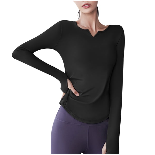 Timegard Yoga Tops for Women Long Sleeve V-Neck Ruched Tee Trackshirts Athletic Workout Running Tops in black. This women's athletic long sleeve top features a fitted silhouette, clean lines, and a ruched V-neck design. Made from breathable fabric, it is ideal for workouts, yoga, or casual wear. Pairs well with leggings, jeans, or slacks and can be layered with cardigans or jackets for added versatility.