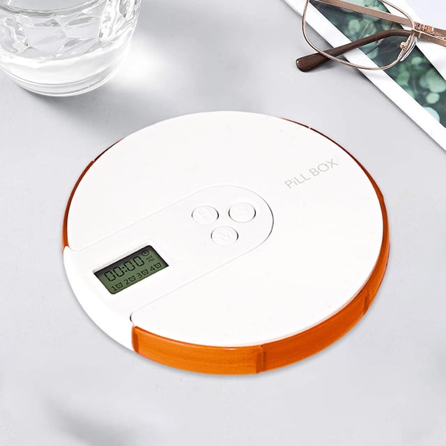 LSLJS Pilulier Organisateur 7 Jours Organisateur Électronique avec Rappels d'Alarme, Distributeur de Pilules portable au design Rond en Plastique Ignifuge orange et Couvercle Blanc. Comprend un Écran LCD pour Fixer des Rappels Intelligents et Trois Boutons pour la Programmation. Comprend Sept Compartiments Séparés pour la Gestion Quotidienne des Médicaments, Léger et Idéal pour les Voyages Ou l'Utilisation Extérieure.