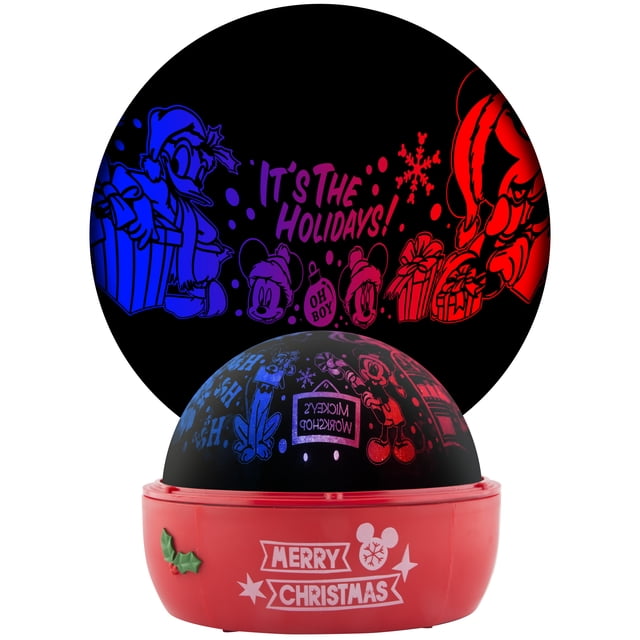 Christmas light projector featuring Mickey Mouse, Donald Duck, Pluto, holiday gifts, snowflakes, and festive text projecting colorful shadows on a wall.