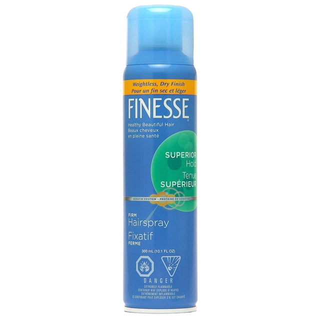 Finesse Vaporisateur Aérosol à Tenue Ferme en Canette Cylindrique Bleue avec Capuchon Bleu Pâle, Offrant une Tenue Forte Toute la Journée et une Finition Sèche Légère. Infusé de Protéines de Kératine pour des Cheveux Plus Sains, Ce Produit de Coiffage 300 ml (10.1 fl oz) Contrôle les Frisottis et les Mouches et Comprend des Avertissements d'Inflammabilité.