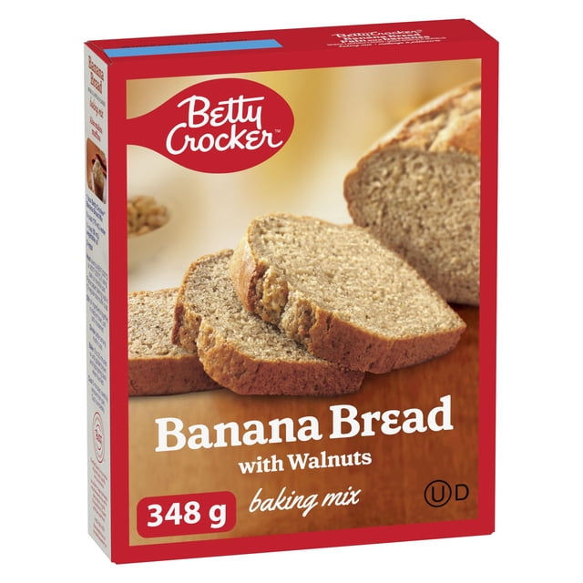 Betty Crocker Banana Bread, 348 g baking mix box with red and beige packaging showing sliced banana bread with walnuts, suitable for making classic banana bread or muffins with recipes on the box