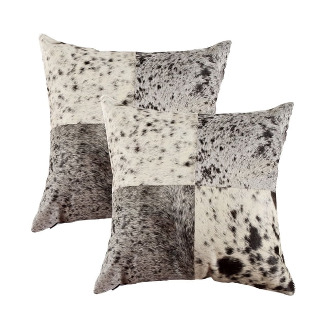 TORINO QUATTRO COWHIDE PILLOW 18"X18" 2-PACK with two hand-stitched square pillows made from 100% natural Indian cowhide in a patchwork of black, white, and grey speckled panels, featuring a hidden zipper and polyfil insert, ideal for layering in home décor and often used as stylish floor cushions.